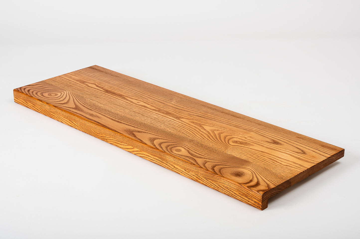 Stair tread Windowsill with overhang Ash A/B, full stave lamellas, 20 mm, Cherry oil