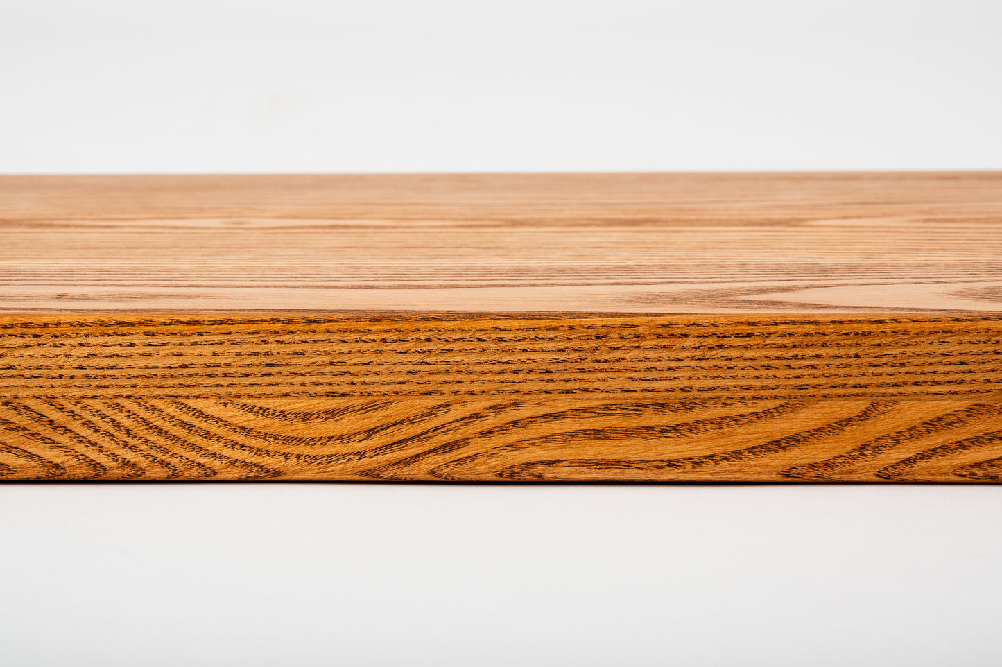 Stair tread Windowsill with overhang Ash A/B, full stave lamellas, 20 mm, Cherry oil